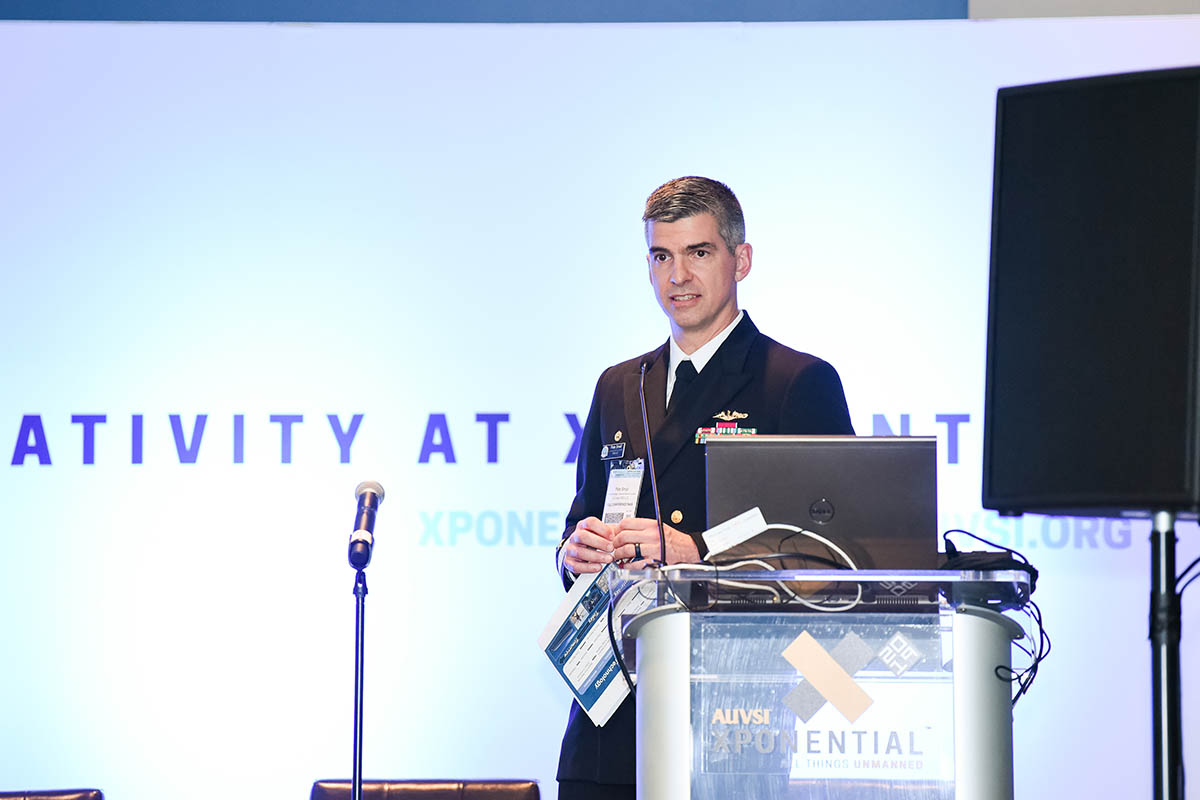 The U.S. Navy's Capt. Pete Small discusses Navy unmanned systems plans at Xponential in Chicago. Photo: Becphotography