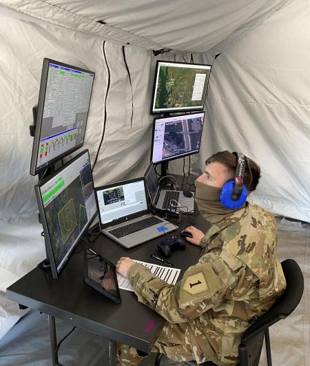 Spc. Nicholas Miller conducts flight operations through a laptop-based ground control station during the FTUAS capabilities assessment at Fort Riley, Kansas, April 8. Photo: Program Executive Office Aviation